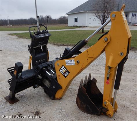 skid steer with backhoe attachment|caterpillar skid steer backhoe attachment.